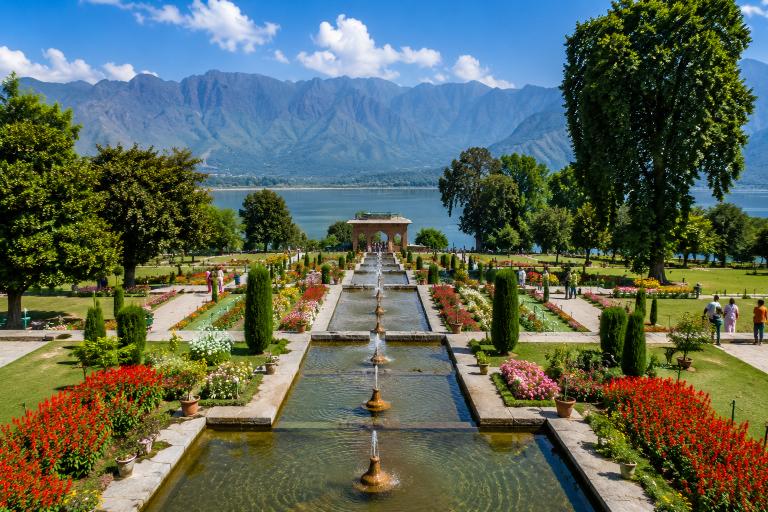Terraced fountains and flower beds of a Mughal garden running down towards Dal Lake